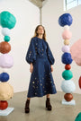 The Ida Skirt in Atelier Splatter Navy paired with the matching Rue Top. 