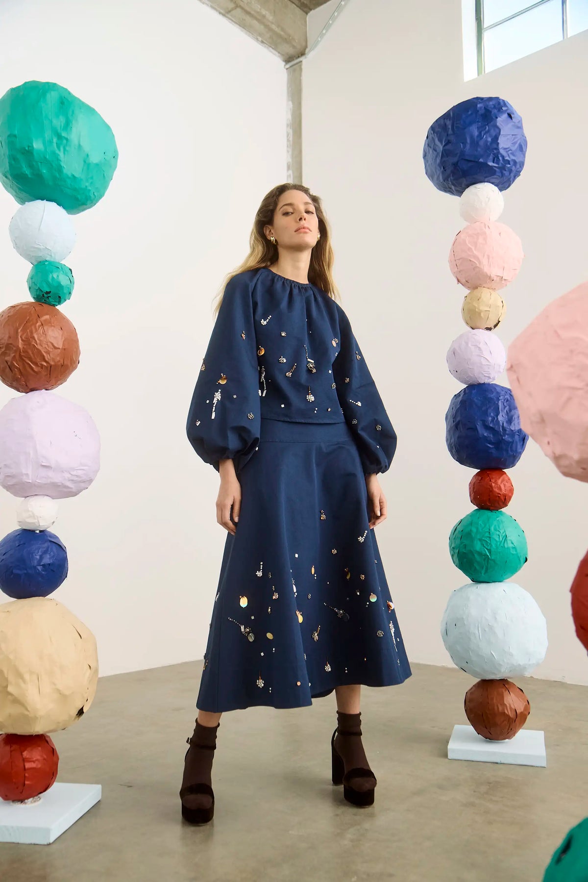 The Ida Skirt in Atelier Splatter Navy paired with the matching Rue Top. 