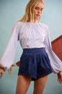 The Faye Short in Deep Sea paired with Rue Blouse in Starlight Embellished Stripe.