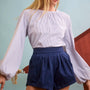 The Faye Short in Deep Sea paired with Rue Blouse in Starlight Embellished Stripe.
