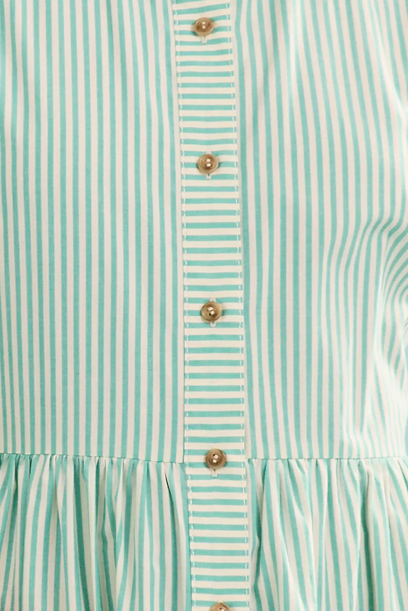 Close up of The Sarah Dress in Saltwater. 