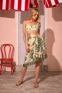 The Sarong in Somers Shell Cream paired with matching Nevis One Piece.