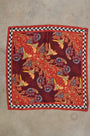 Flatlay of the Scarf in Birds of a Feather Maroon.