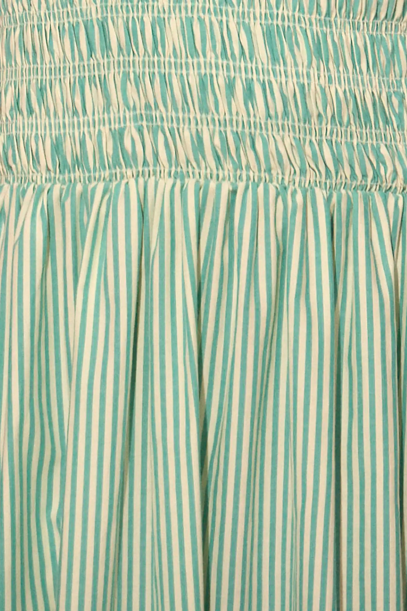 Close up of The Scarlet Dress in Saltwater.