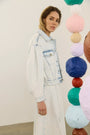 The Solene Jacket in Washed Blue Denim paired with matching Sedona Dress. 