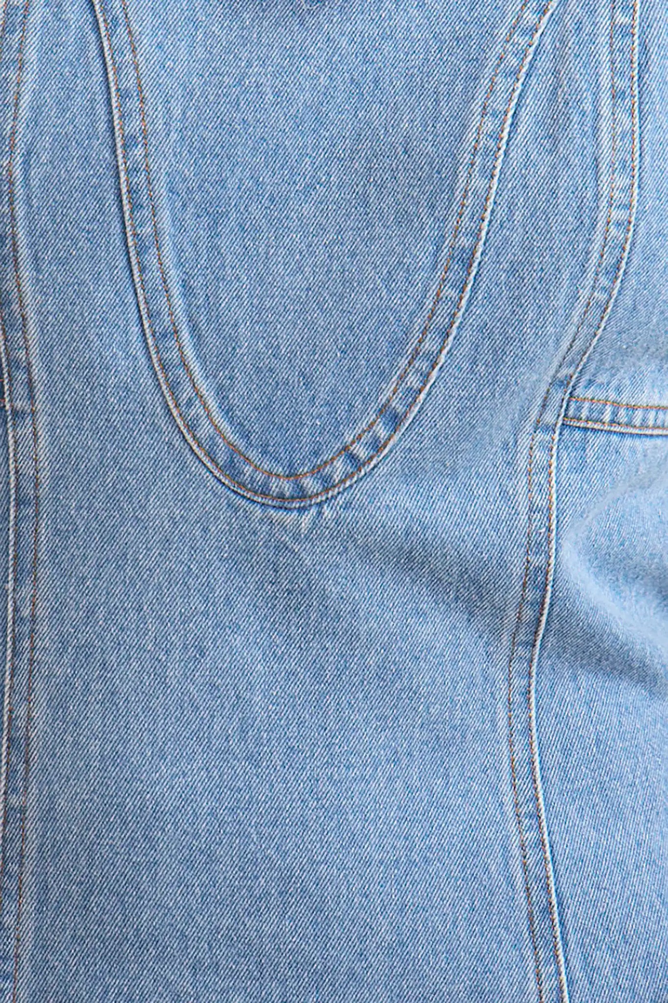 The Sedona Dress has a sleeveless crew neck, detailed seaming, a fitted bodice, and kick pleats.