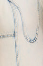Close up of The Sedona Dress in Washed Blue Denim. 