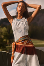 The Sedona Dress in Washed Blue Denim paired with the oversized scarf in Amber Glen Brown. 