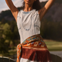 The Sedona Dress in Washed Blue Denim paired with the oversized scarf in Amber Glen Brown. 