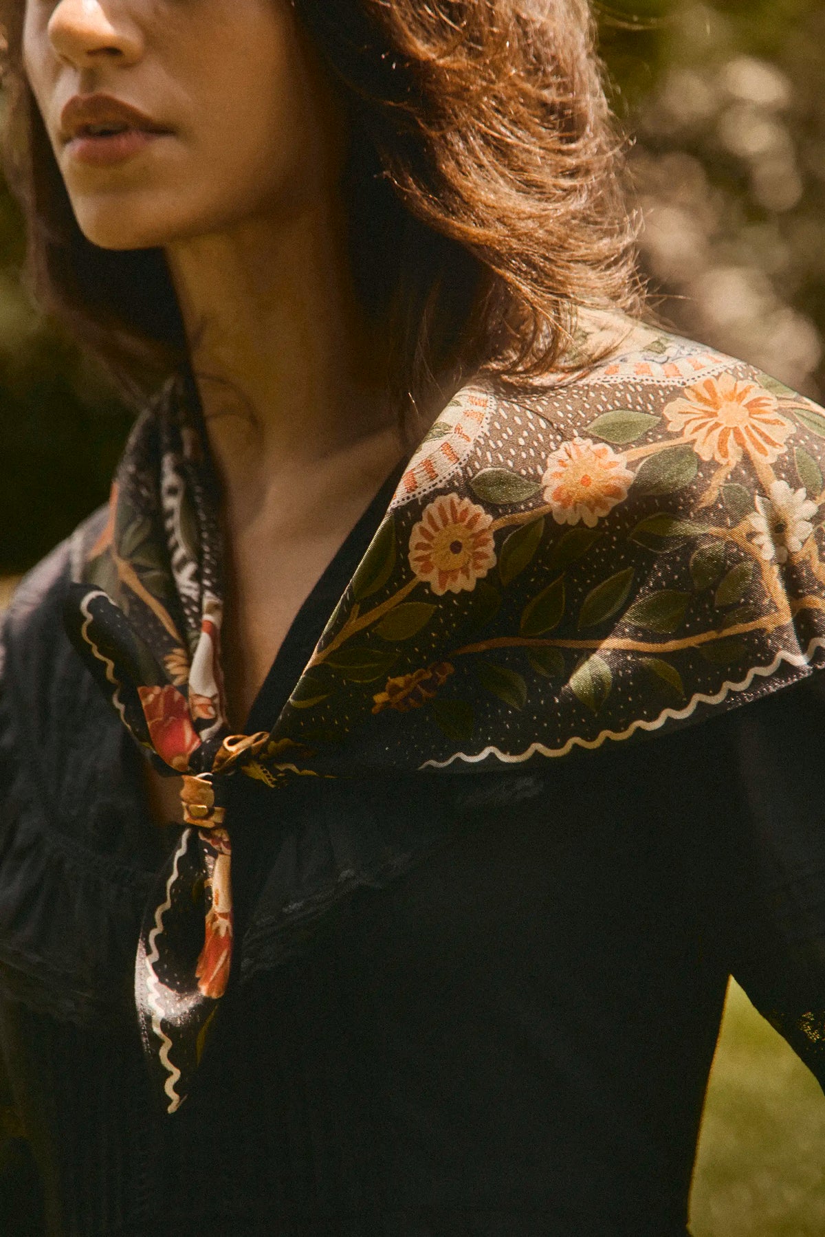The Selena DRess in Onyx paired with the Found Heirloom matching scarf. 