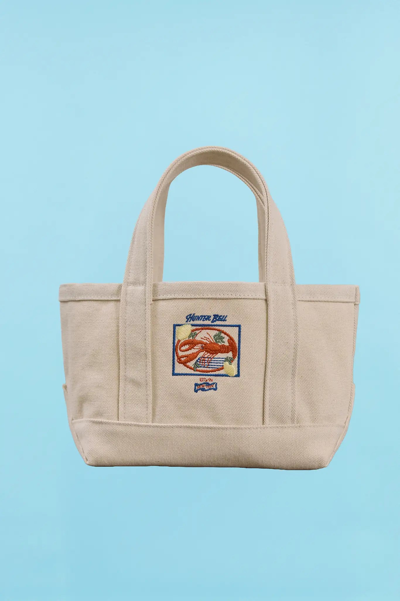 The front of the small canvas tote bag with lobster