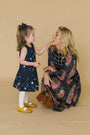 Natalie Steen in the Bini Top and the Tenley Dress.