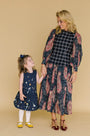 Natalie Steen in the Bini Top and the Tenley Dress.