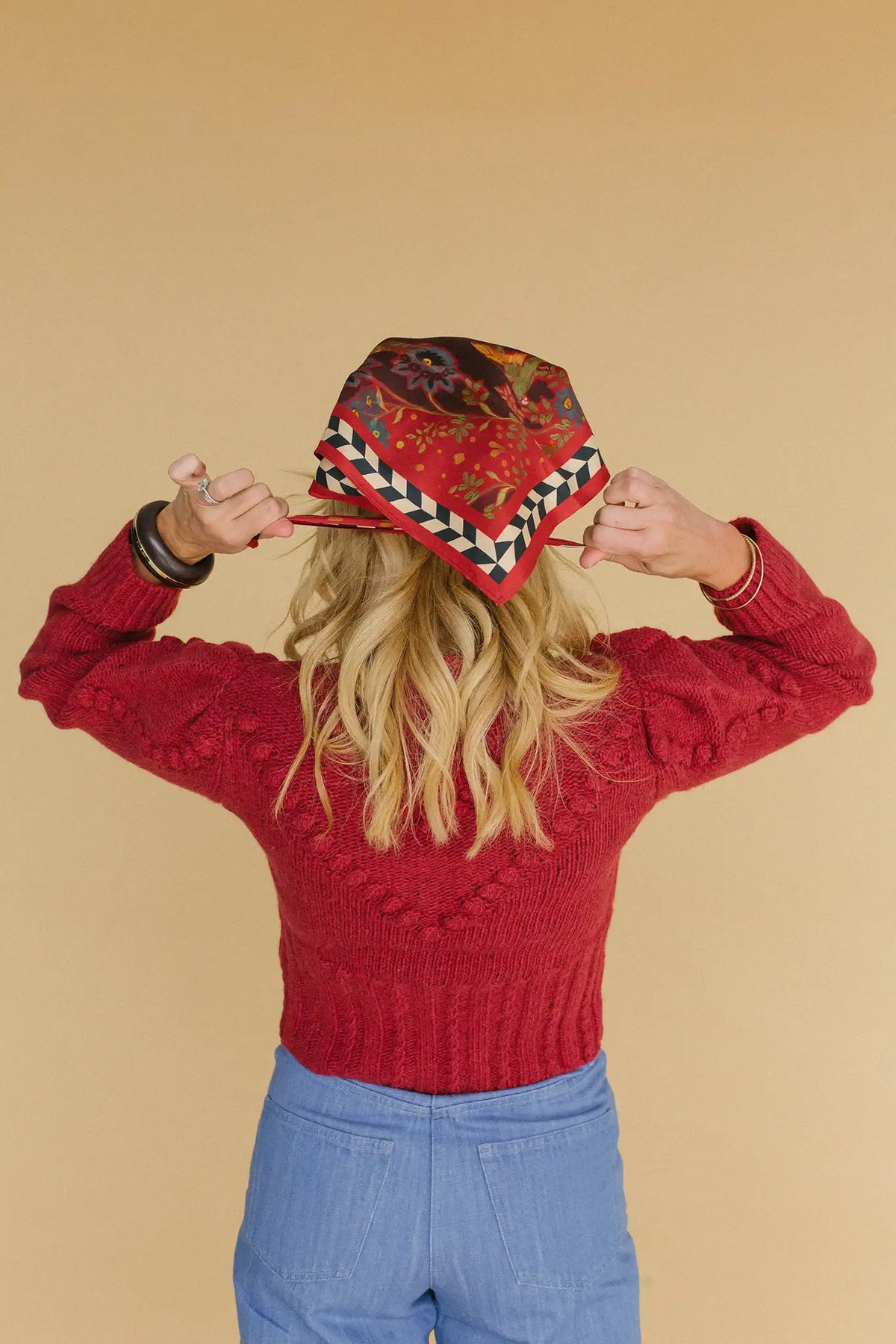 Natalie Steen in the Bobble Sweater and Birds of a Feather Maroon scarf.