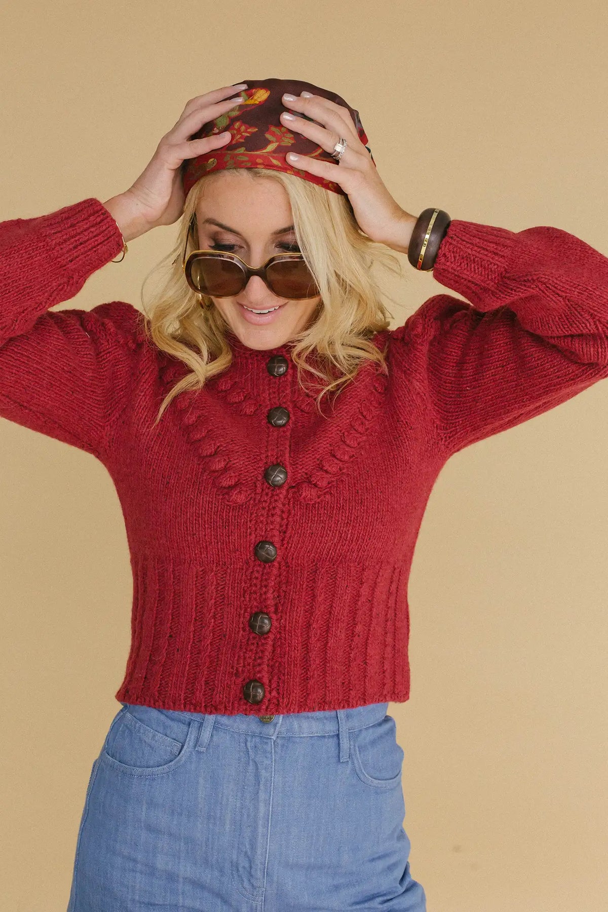 Natalie Steen in the Bobble Sweater and Birds of a Feather Maroon scarf.