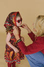 The Kids Piper Dress in Birds of a Feather Maroon. 