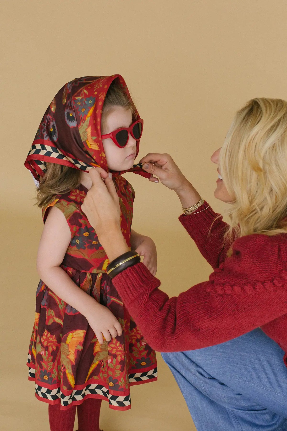 The Kids Piper Dress in Birds of a Feather Maroon. 