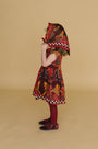 The Kids Piper Dress in Birds of a Feather Maroon. 