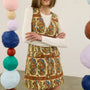 Callie Sweater in cream paired with Suni Dress in Amber Glen Cream.
