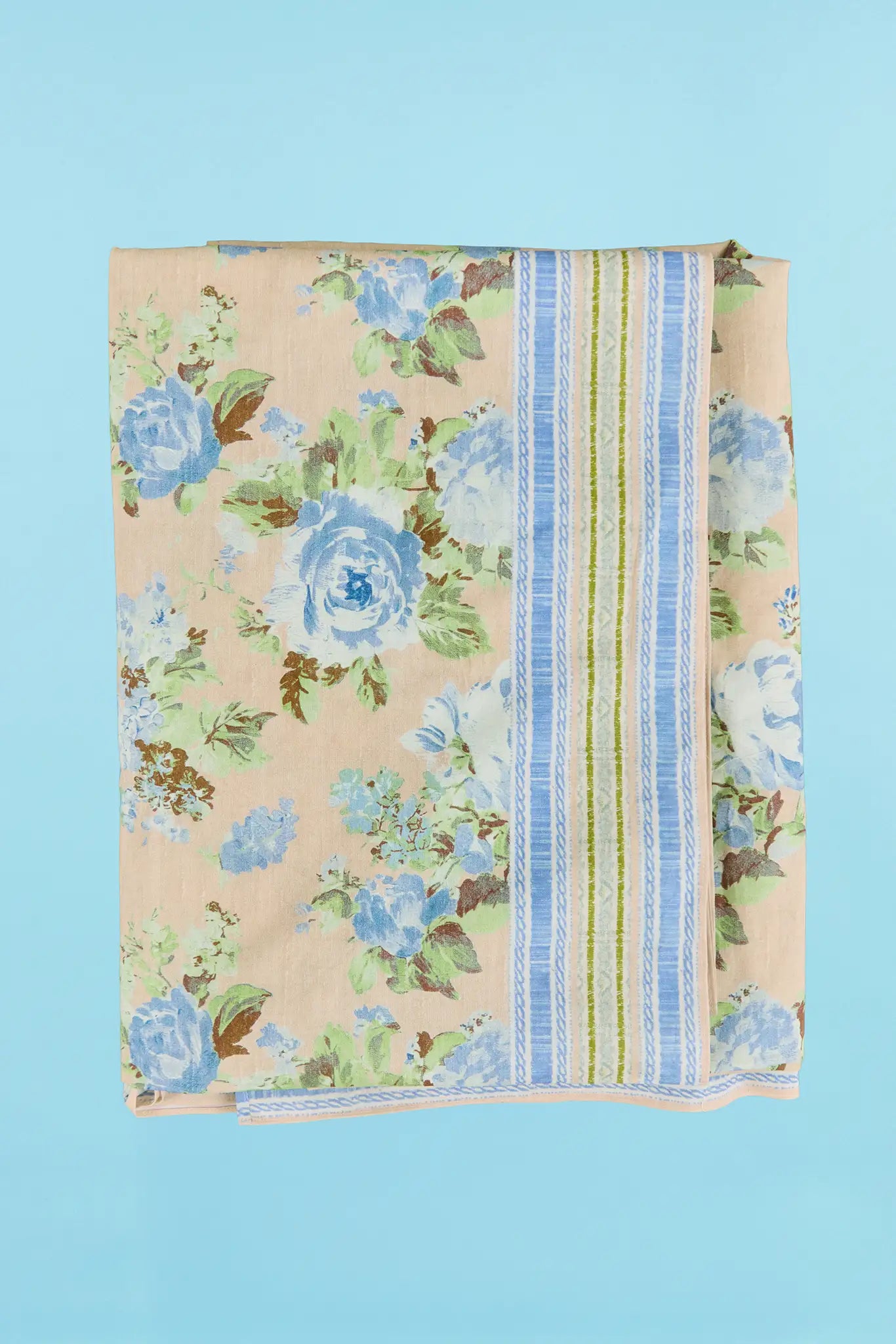 Tablecloth in Garden Rose Periwinkle, sized 71" x 120".