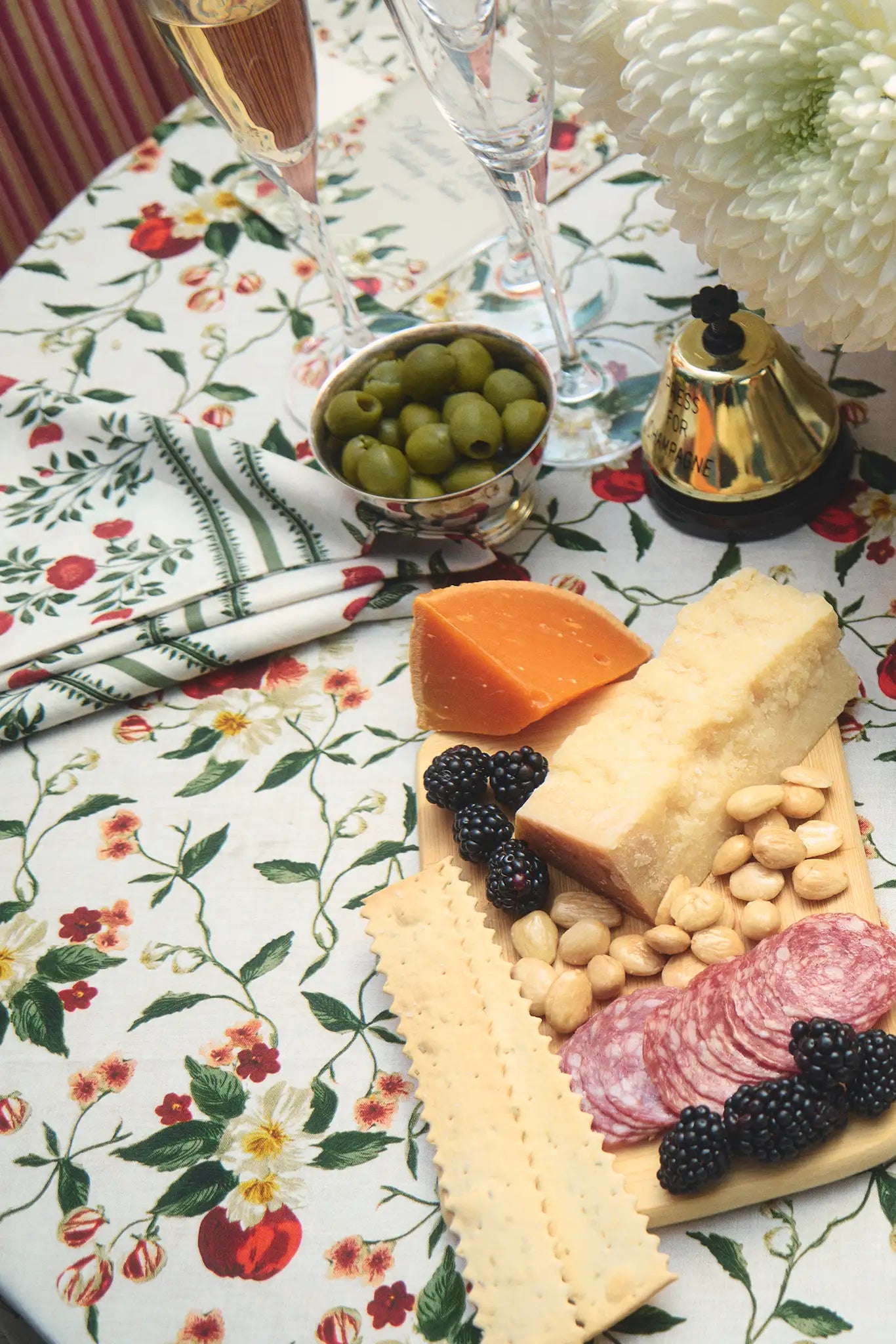 The Camellia Table Cloth with the Camellia Napkin Set in Camellia Ivory.