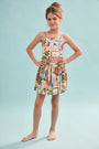 The Kids Tank Swimsuit in Coastal Conversation paired with matching rosie skirt