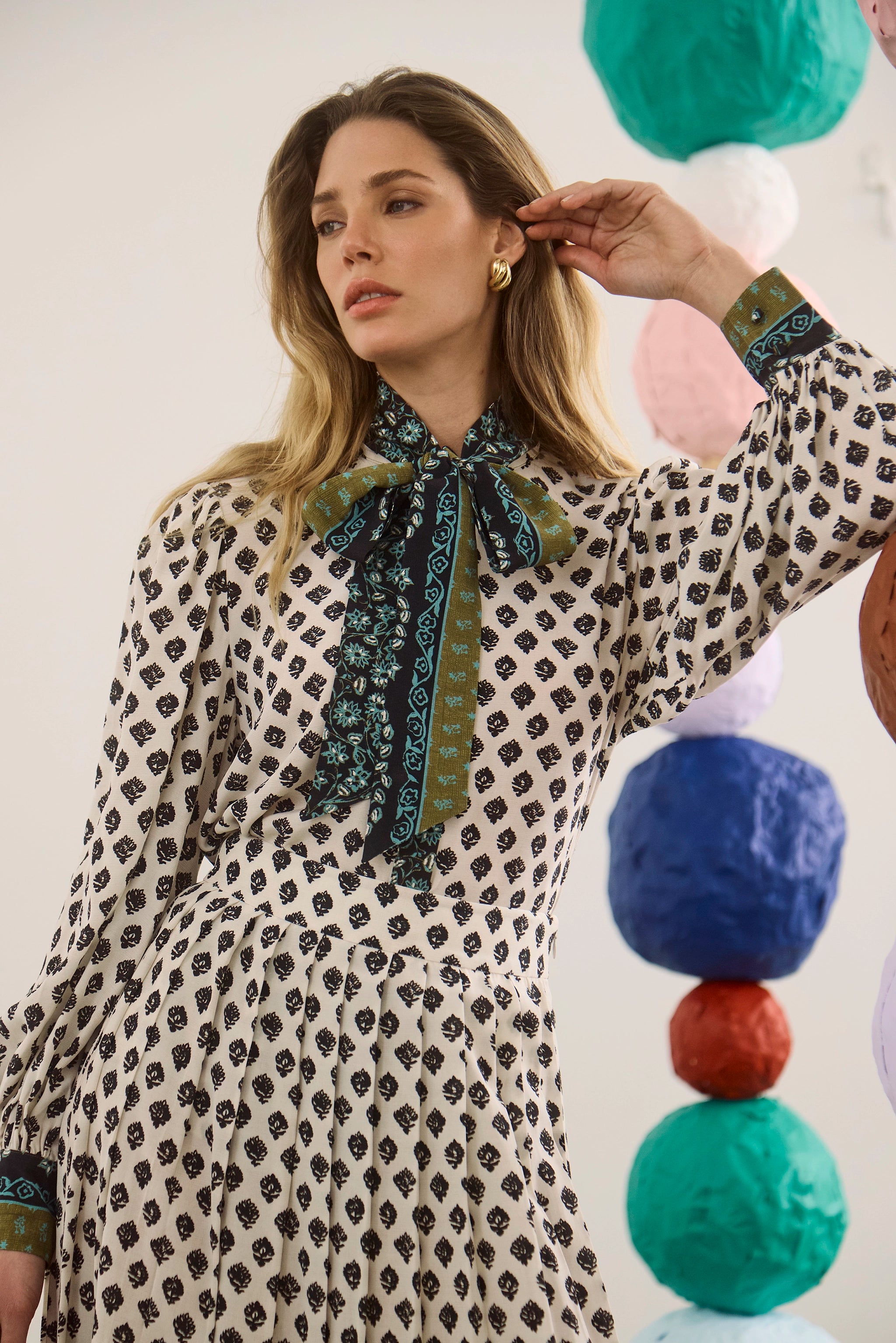 The Tess Blouse in Thistle and Vine Cream paired with the matching Dominic Skirt. 
