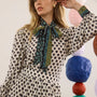 The Tess Blouse in Thistle and Vine Cream paired with the matching Dominic Skirt. 