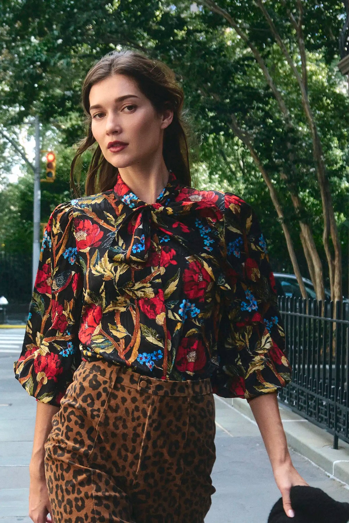 The Tess Blouse in Palais Floral Onyx paired with the Hills Pant in Soho Leopard Camel.