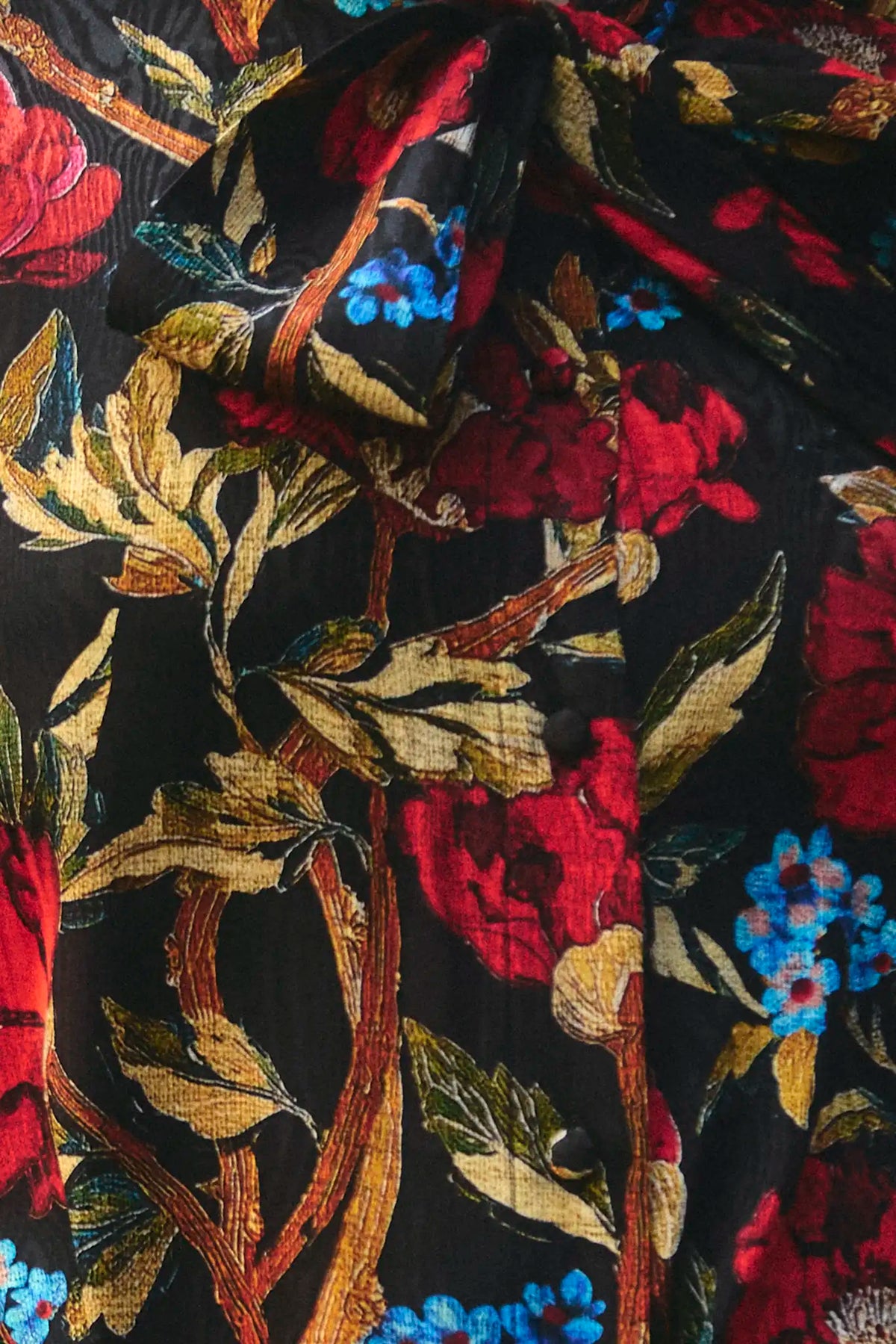 Close up of the Tess Blouse in Palais Floral Onyx. 