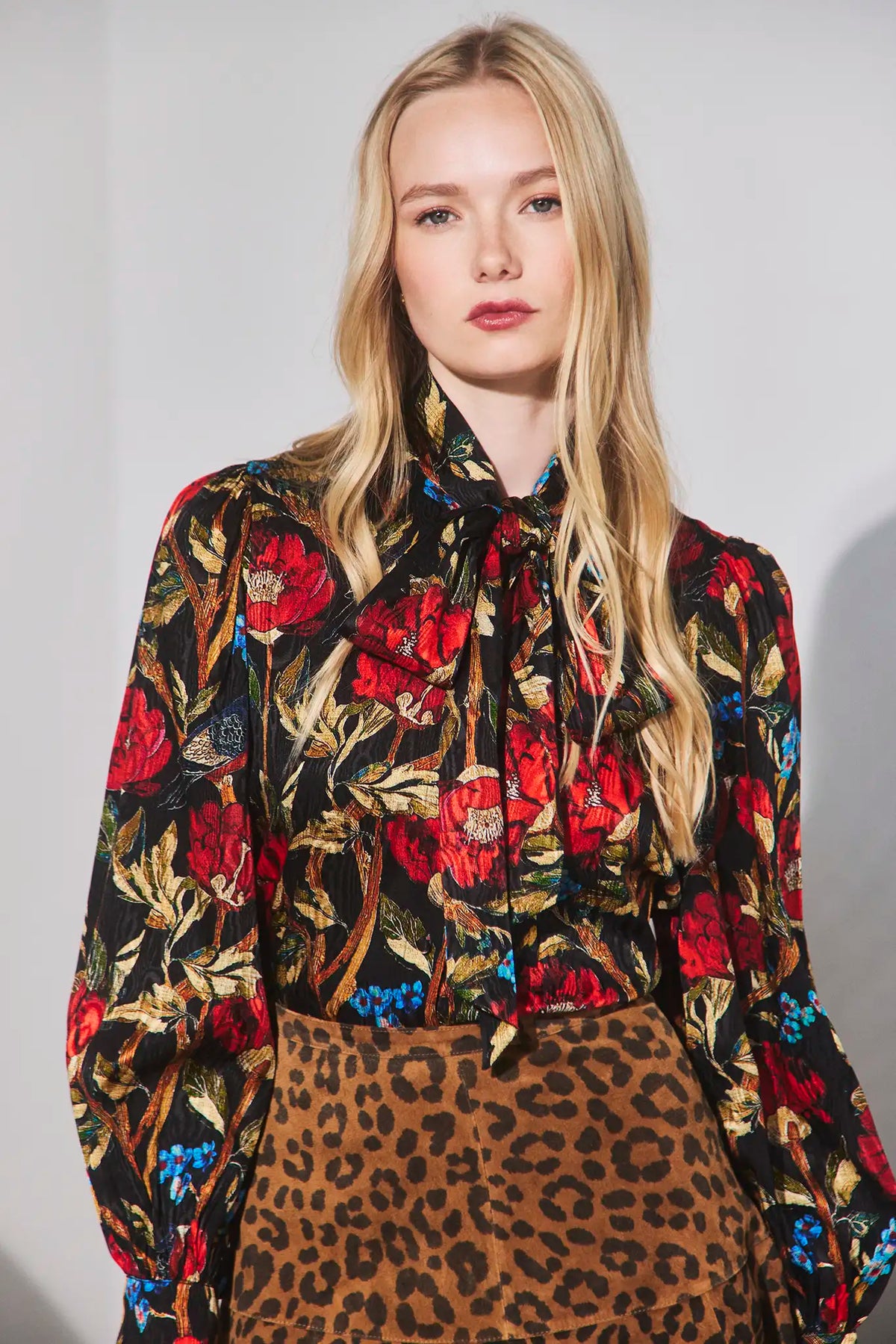 The Tess Blouse in Palais Floral Onyx paired with the Hills Pant in Soho Leopard Camel.