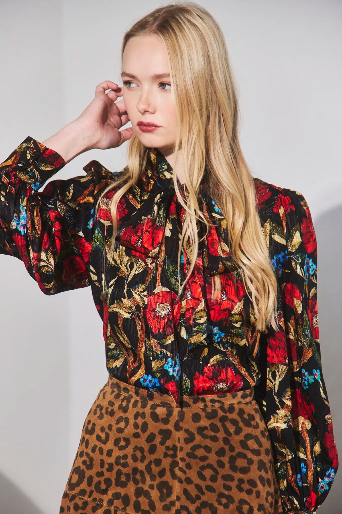 The Tess Blouse in Palais Floral Onyx paired with the Hills Pant in Soho Leopard Camel.