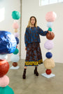 The Berkman Skirt in Wild Vine Brown paired with Tilda Top in Wild Vine Blue. 