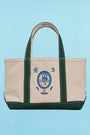 The medium canvas tote bag with green handles and fish motifs