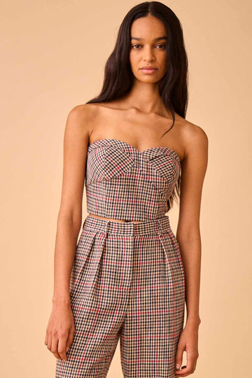 The Scottie top is a fitted bustier top with a sweetheart neckline in a sophisticated houndstooth.