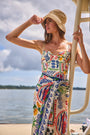 The Underwire One-Piece Swimsuit in Coastal Conversation paired with matching sarong