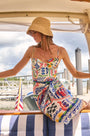 The Sarong in coastal conversation paired with matching One piece swimsuit