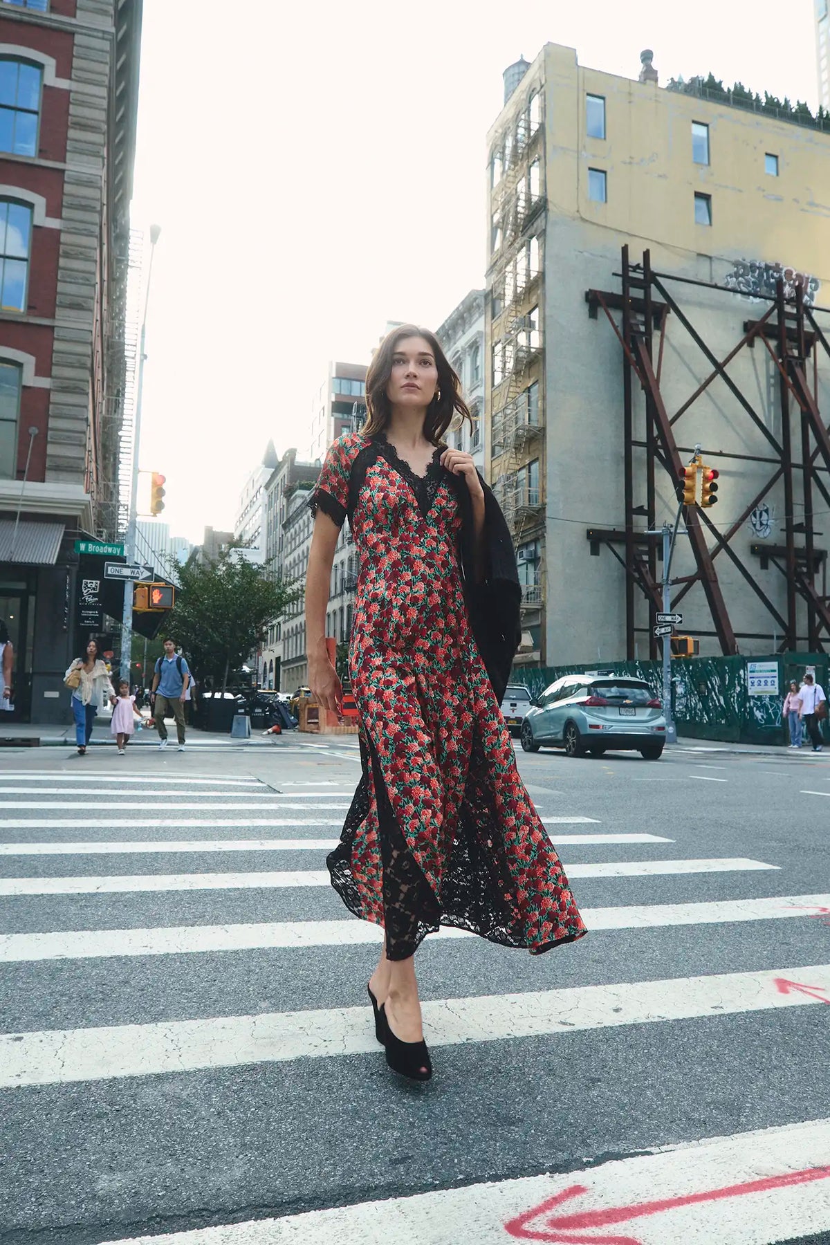 The Vela Dress in Crimson Blossom paired with the Brooke Cardigan.