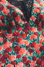 Close up of the Vela Dress in Crimson Blossom.