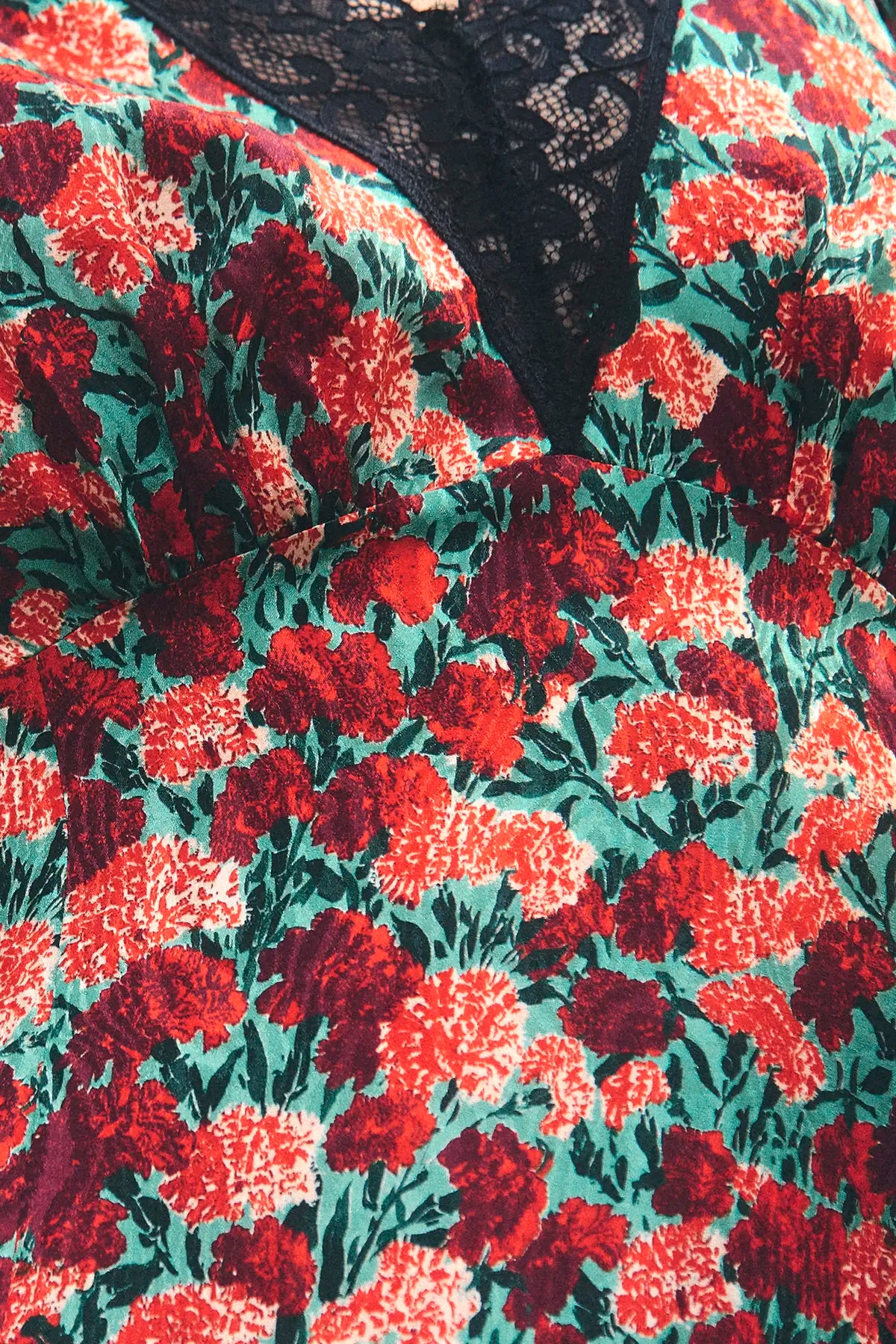 Close up of the Vela Dress in Crimson Blossom.