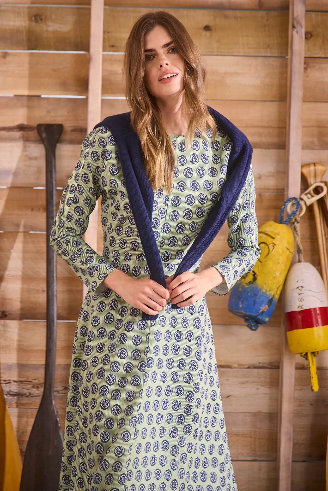 Midi dress with a clean crew neckline, modern dolman sleeves, with a circle-cut skirt.