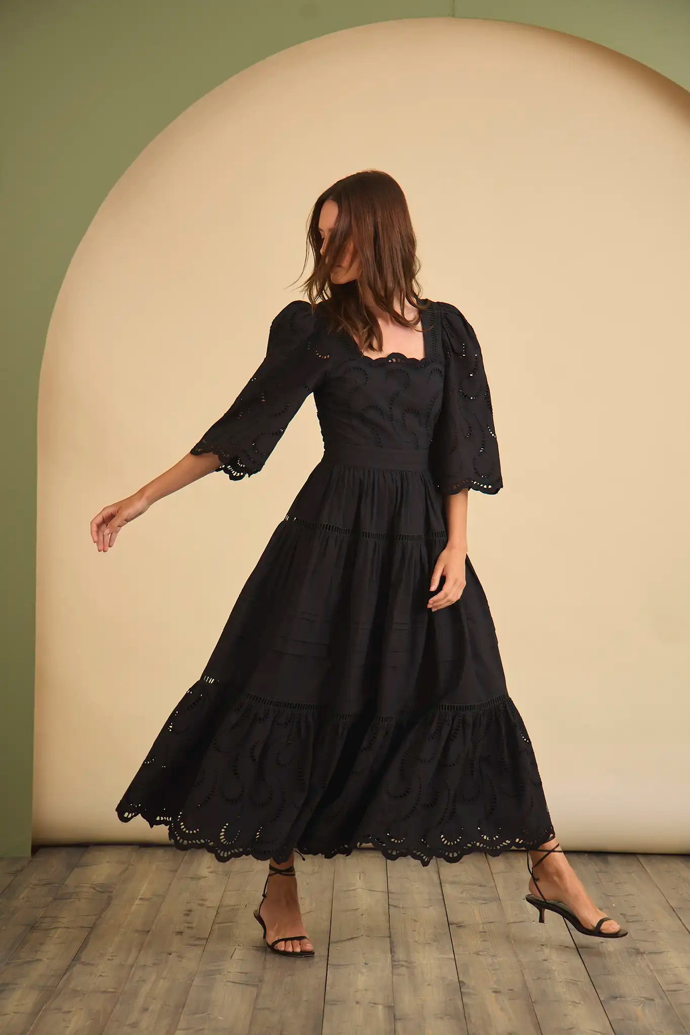 The Zadie Dress has a square neckline, flowy elbow-length sleeves, a fitted bodice and a full skirt.