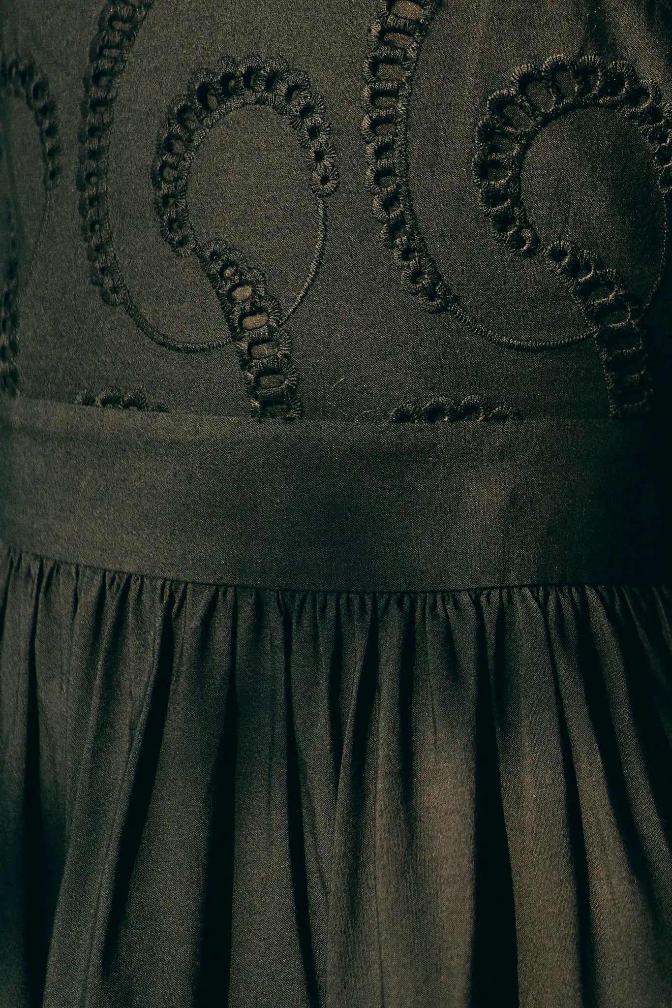 The Zadie Dress has a square neckline, flowy elbow-length sleeves, a fitted bodice and a full skirt.