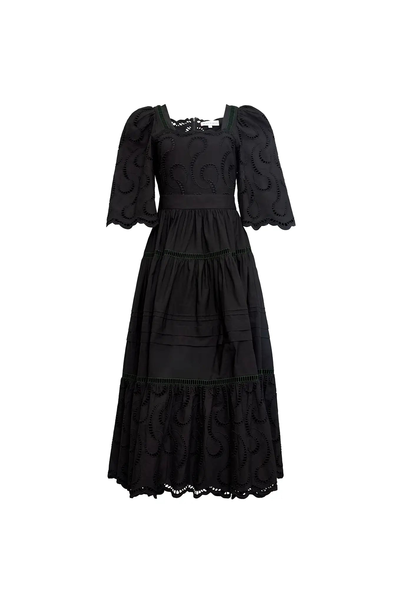 The Zadie Dress has a square neckline, flowy elbow-length sleeves, a fitted bodice and a full skirt.