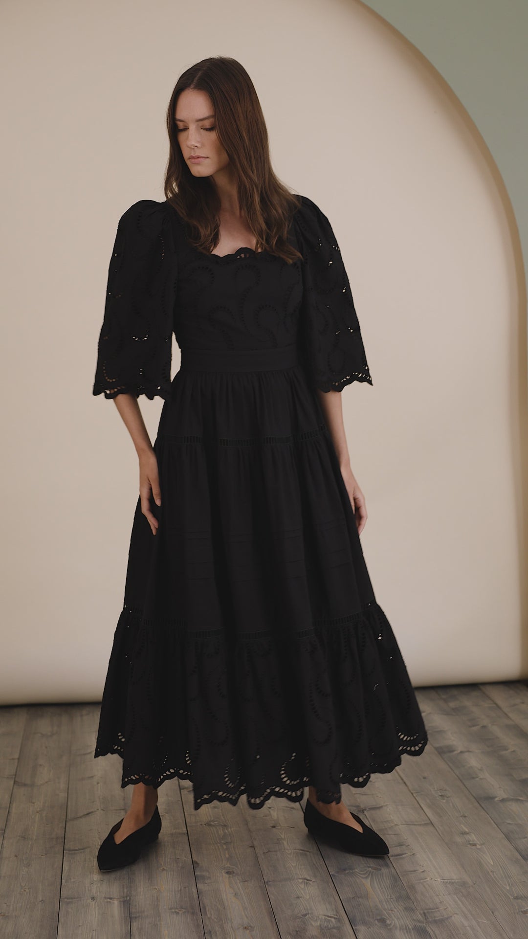 The Zadie Dress has a square neckline, flowy elbow-length sleeves, a fitted bodice and a full skirt.