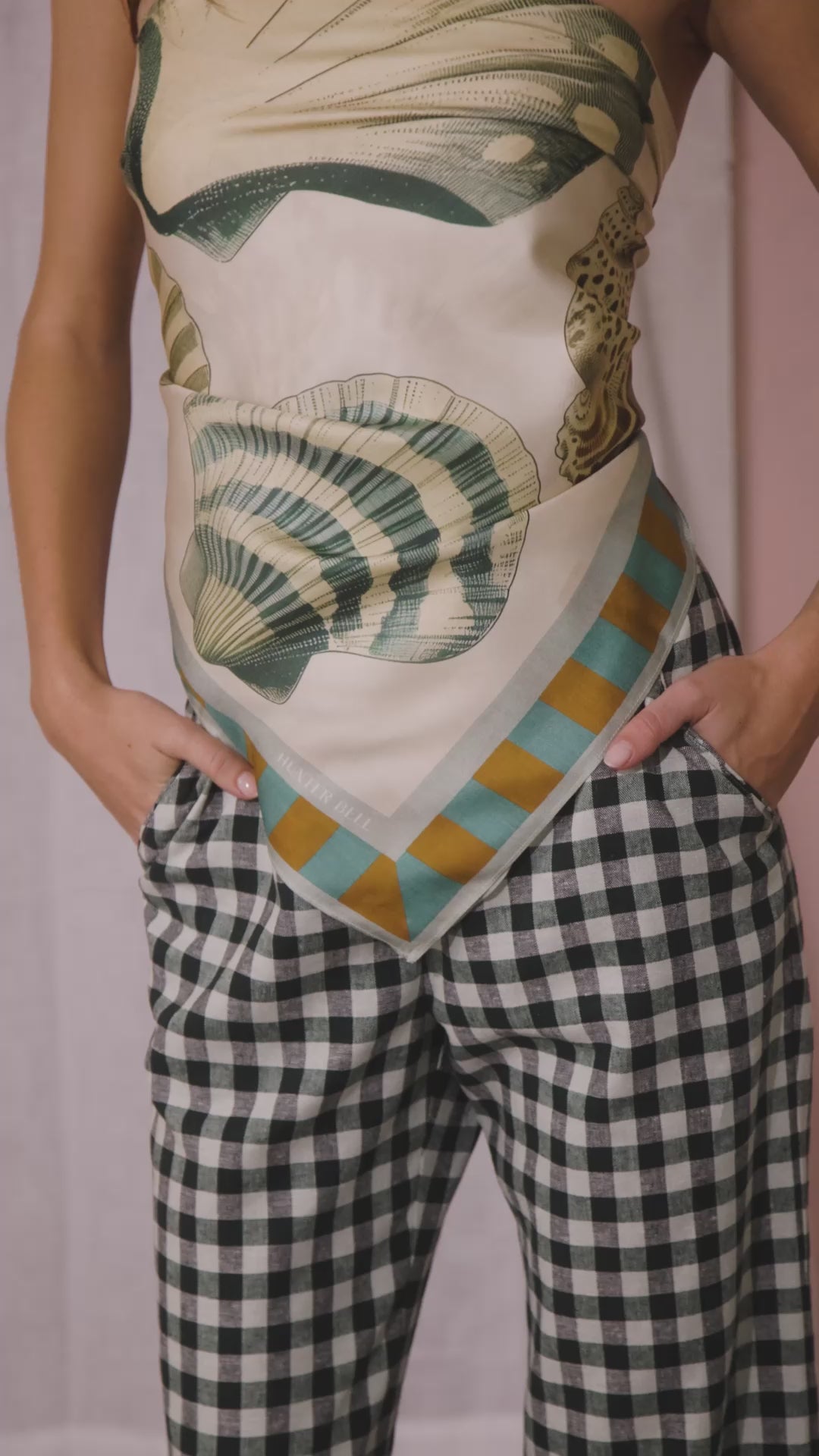 he Coquille Scarf styled as strapless top paired with Juno Pant in Hamilton Check.
