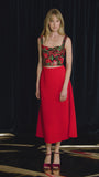 The Adele Skirt, cut on the circle from saturated red crepe with a clean waist and side seam zipper