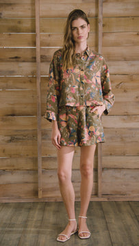 Olive Floral print, boxy collared shirt with button front and wide cropped sleeves, and oversized.
