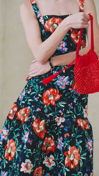A midi skirt in a quilted velour, with a banded waist, a full skirt, fitted at the yoke and hips.