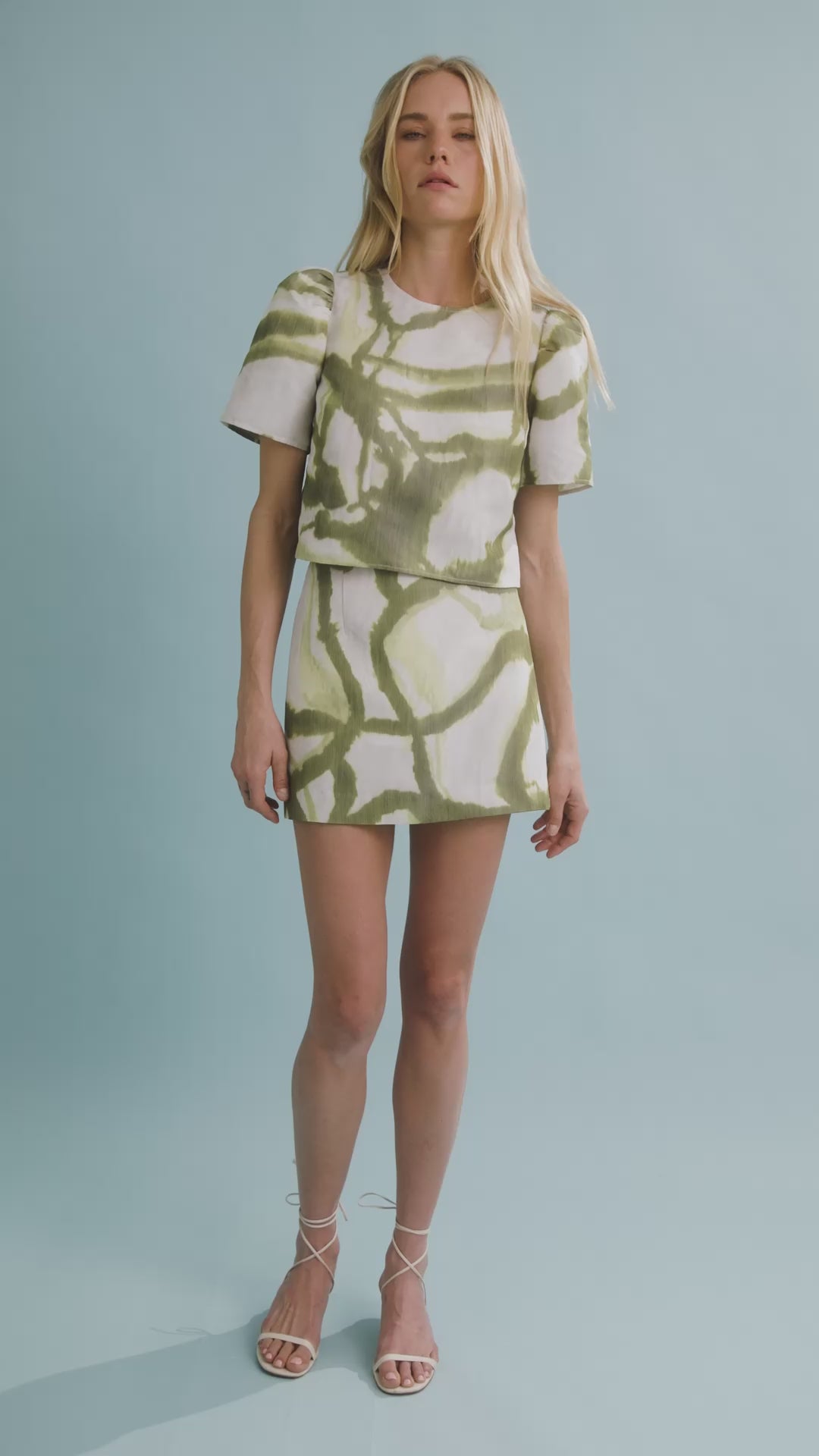 The Olivia Top in Seabreeze Ikat Green with matching Britt Mini Skirt.